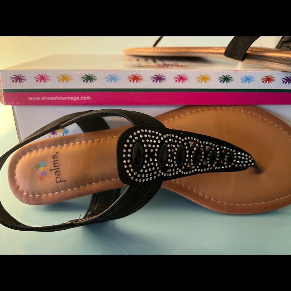 New black flat sandals